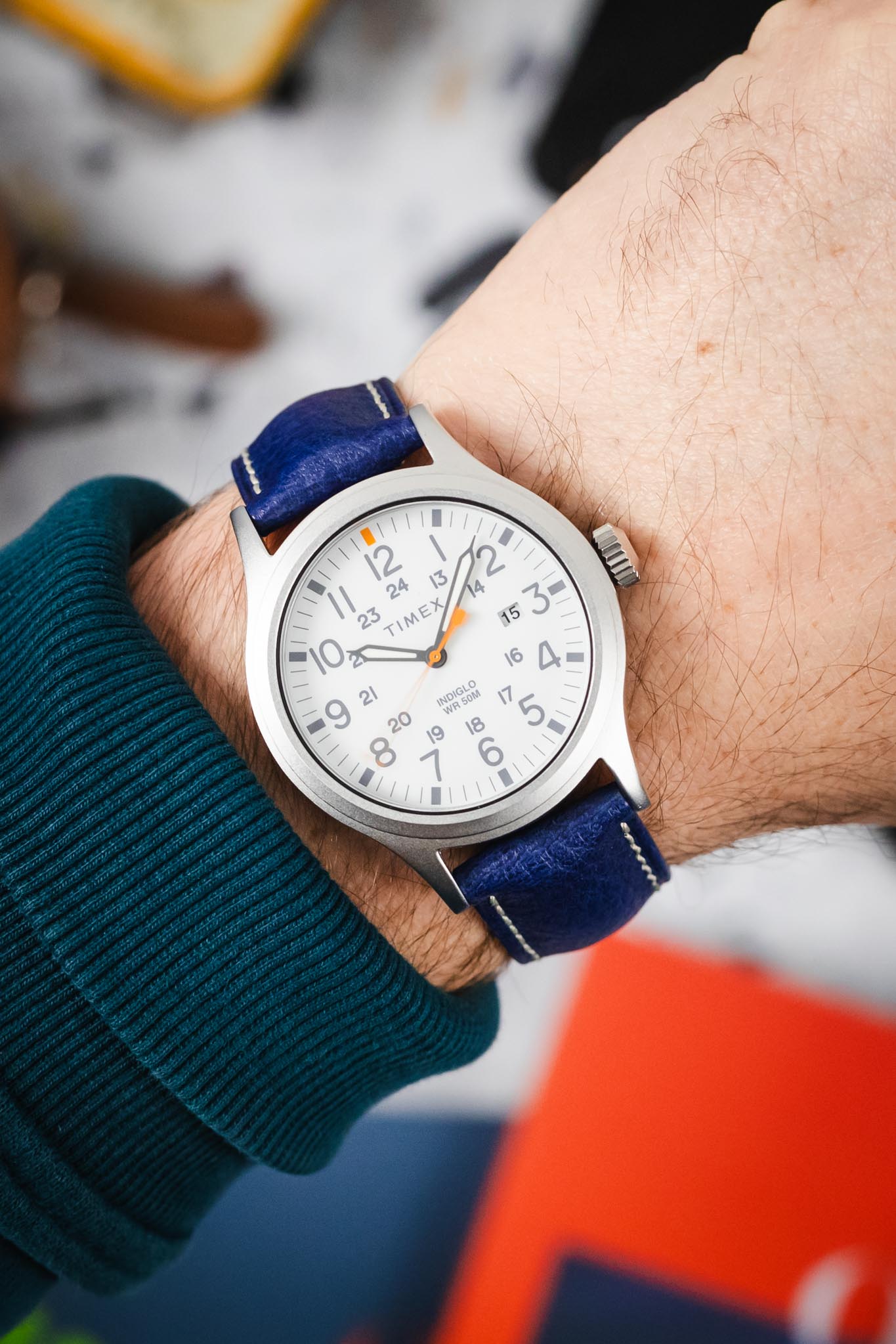 Wrist shot of a Timex Indiglo watch fitted with the vibrant Hirsch Boston Blue genuine leather watch strap.