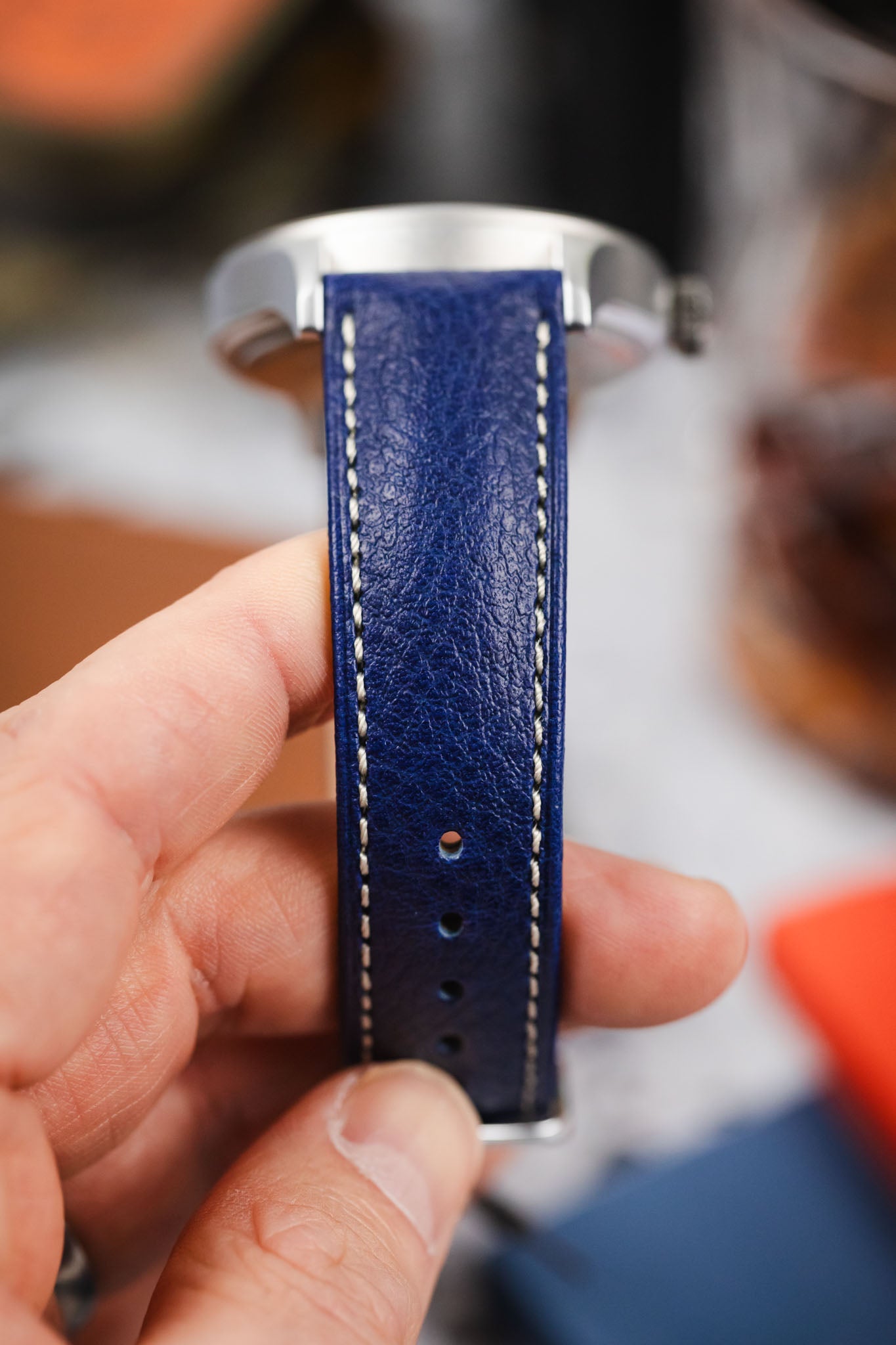 Detailed view of the rich, blue textured leather and white stitching of the Hirsch Boston strap. Perfect watch strap upgrade.