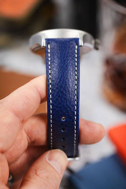 Detailed view of the rich, blue textured leather and white stitching of the Hirsch Boston strap. Perfect watch strap upgrade.