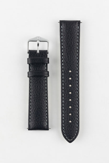 High-quality black watch strap with subtle grain texture and contrast white stitching, laid flat, with a classic silver buckle.