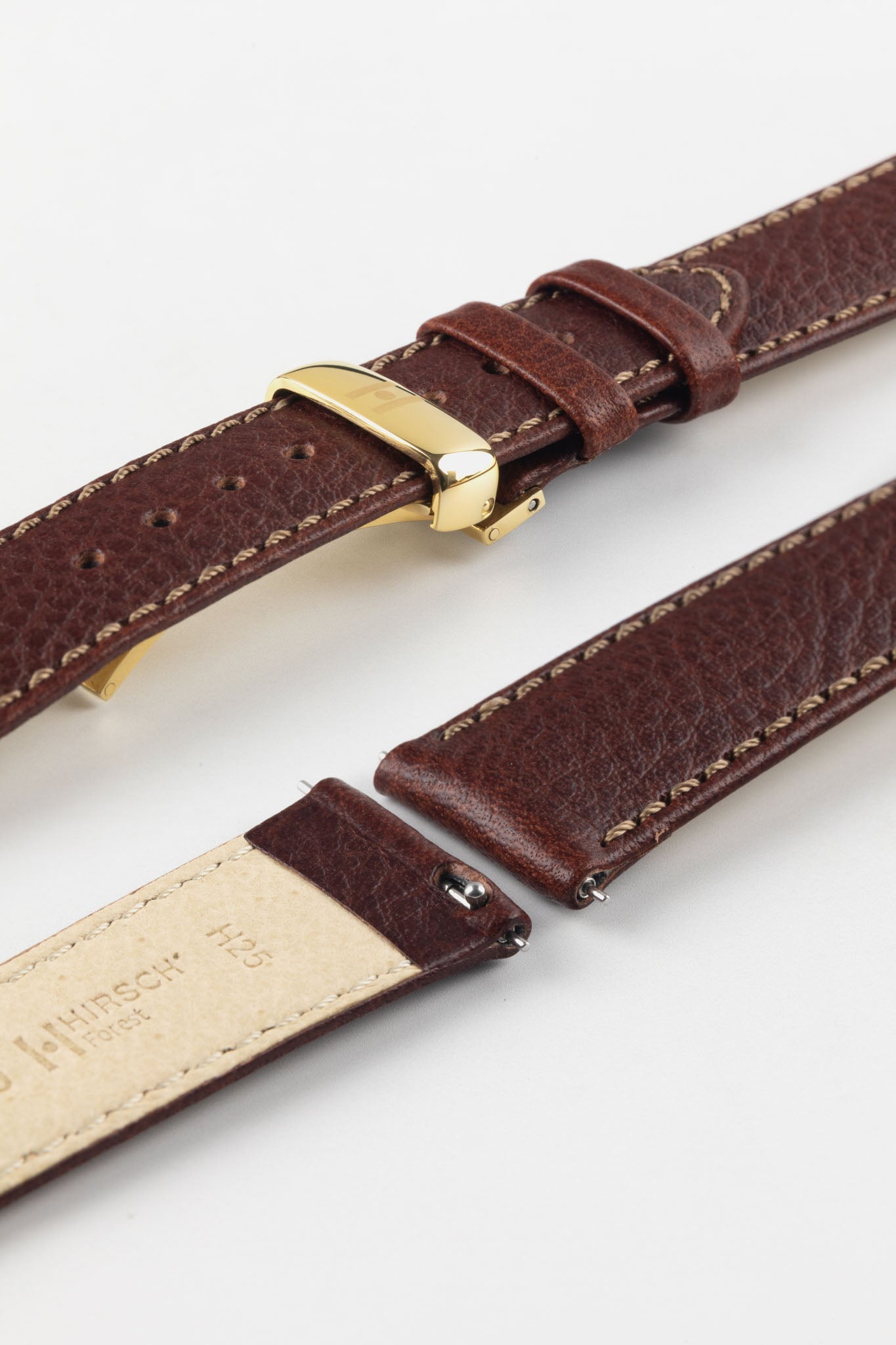 Close-up of HIRSCH Forest brown quick-release watch strap with gold deployment clasp for easy strap changes.