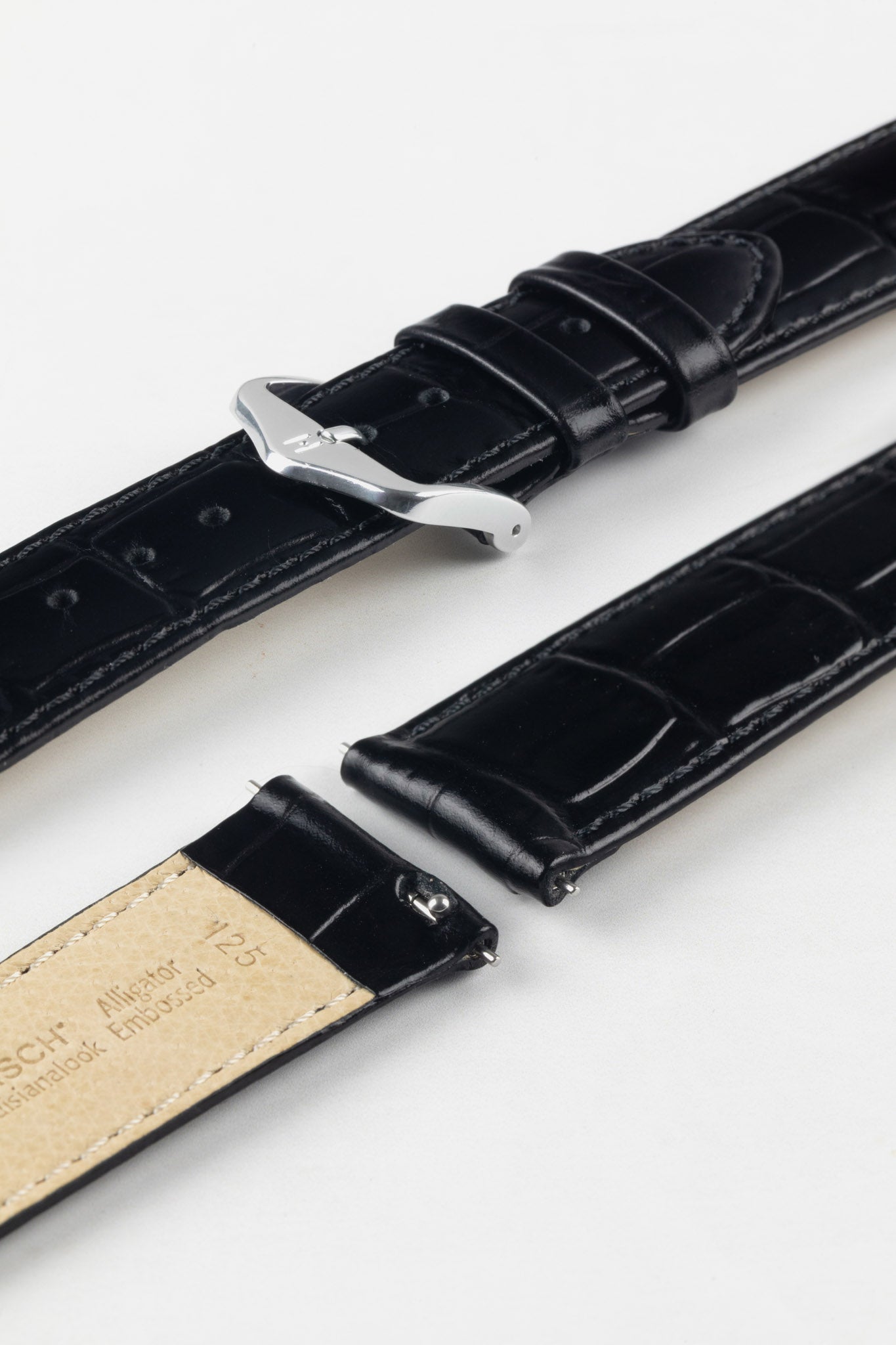 HIRSCH Louisianalook Black quick-release strap detail with alligator-look texture and a classic silver buckle.