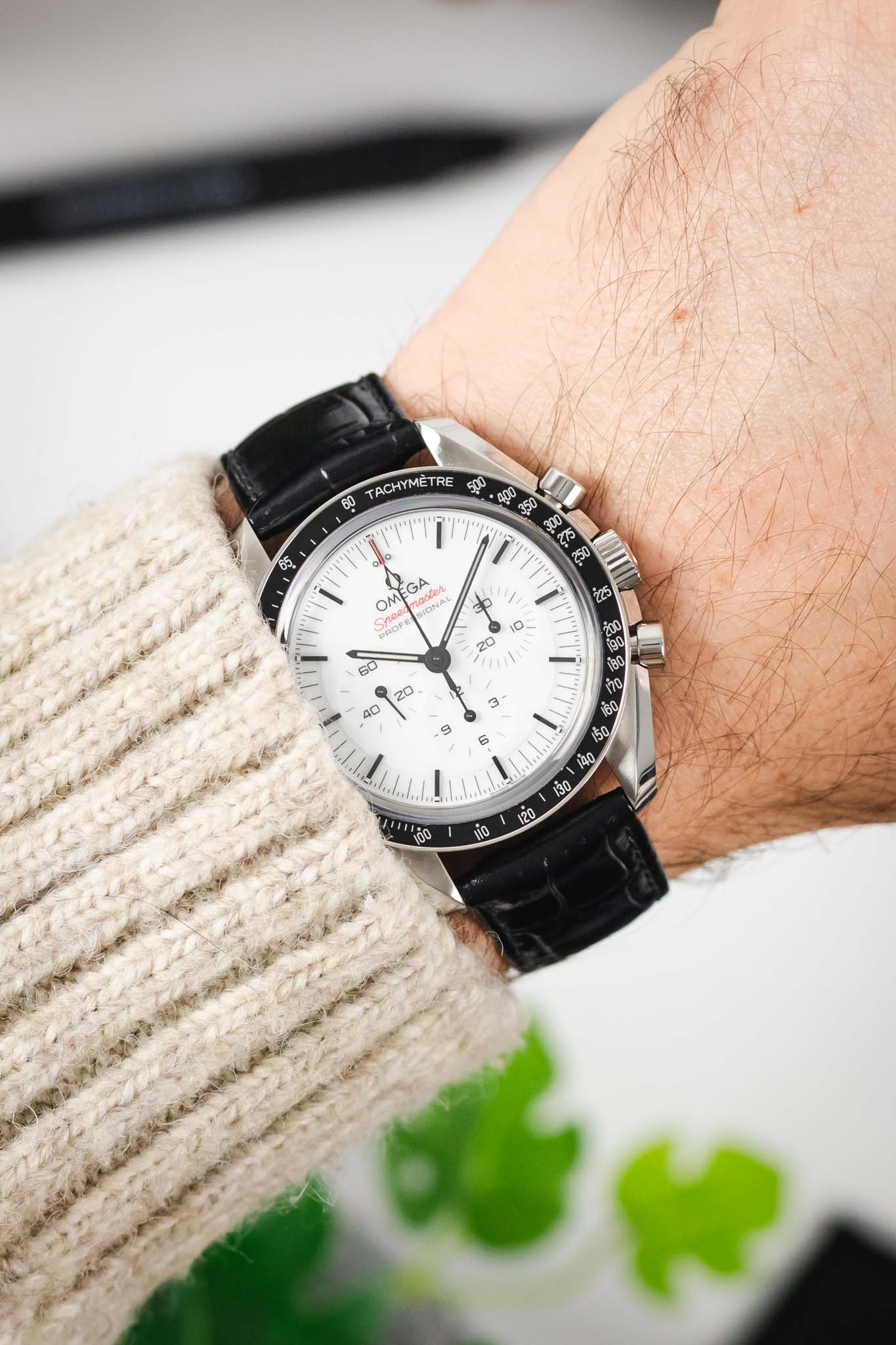 Seiko Presage automatic dress watch with a black dial on a classic black Louisianalook strap, worn on a wrist.