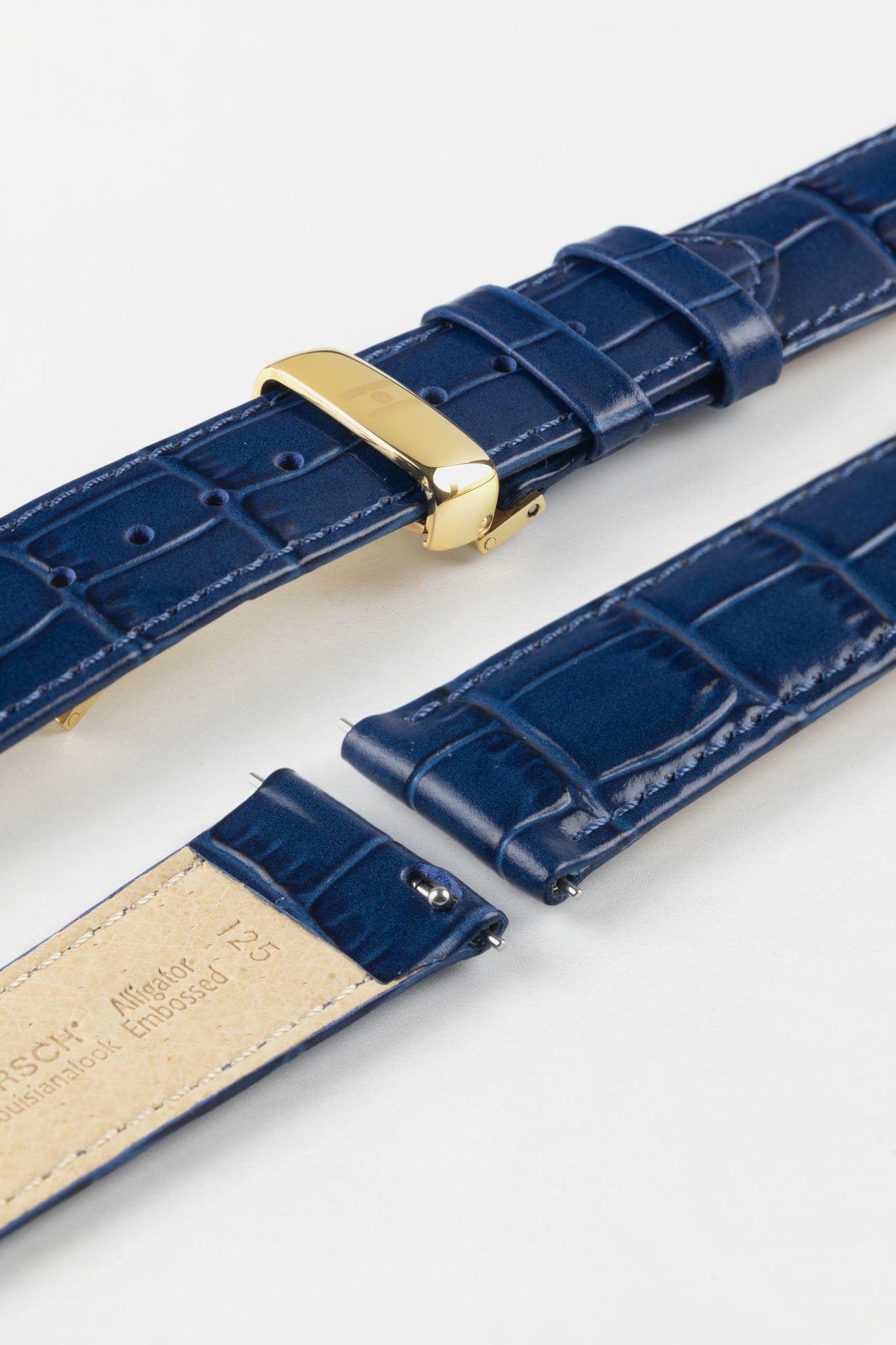 Detail shot of the Louisianalook Blue strap's quick-release pins and gold deployment clasp for easy fitting.