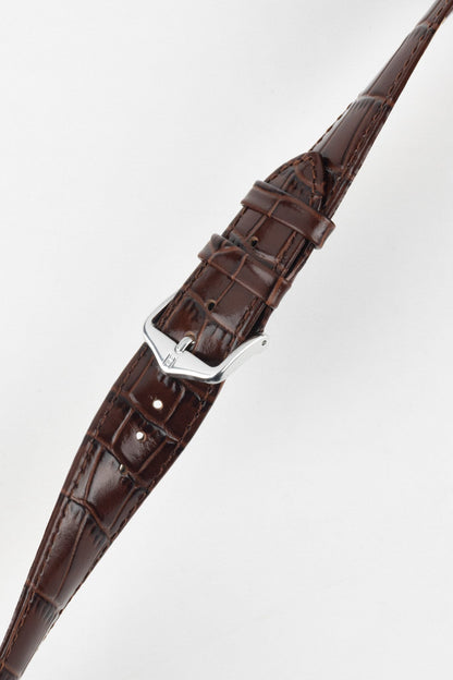 Angled shot of a polished silver buckle on the stylish and affordable Louisianalook Brown watch strap.