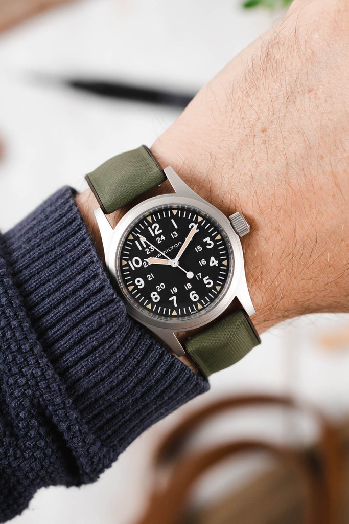 army green watch strap on wrist