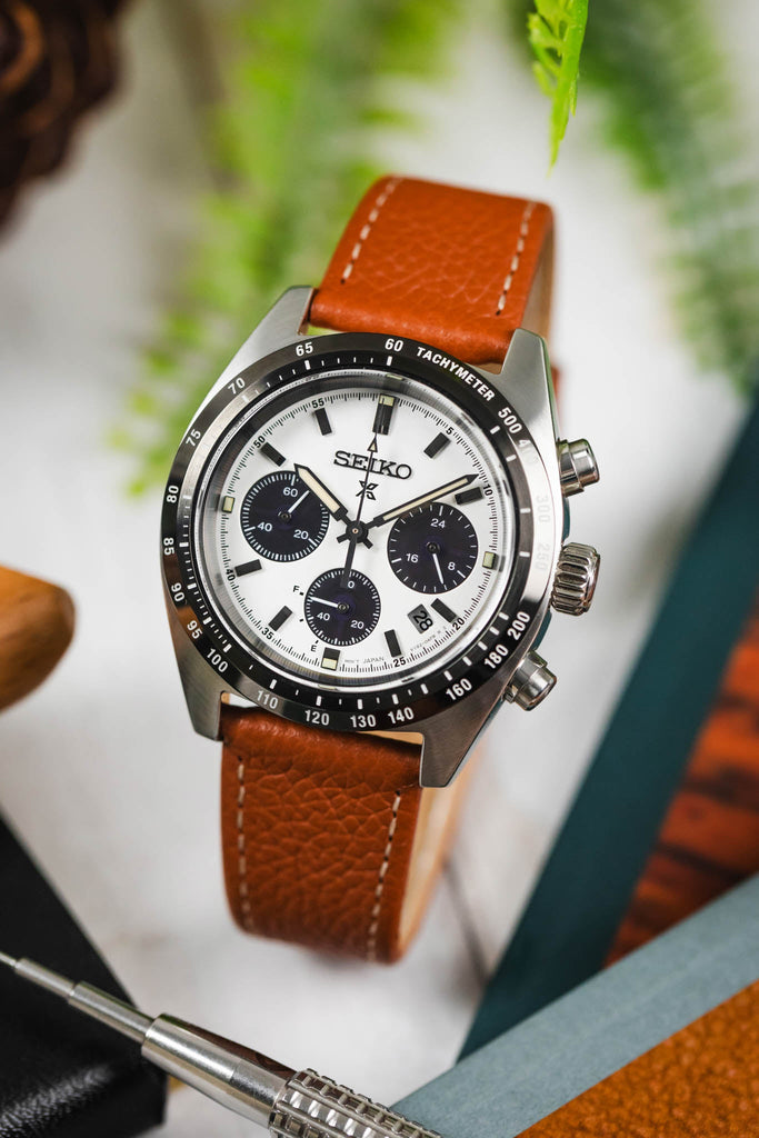 Seiko Prospex speedtimer white and black panda chronograph fitted with gold brown hirsch bologna leather watch strap curved